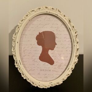 Vintage White Ornate Oval Frame with Pink Silhouette Art